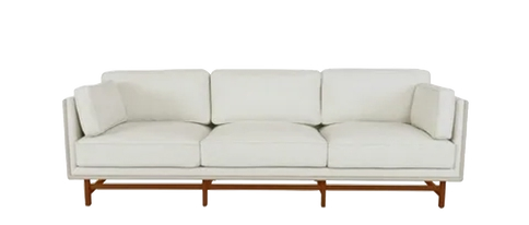 white color three seater sofa