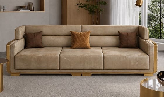 Worn luxury sofa before upholstery restoration